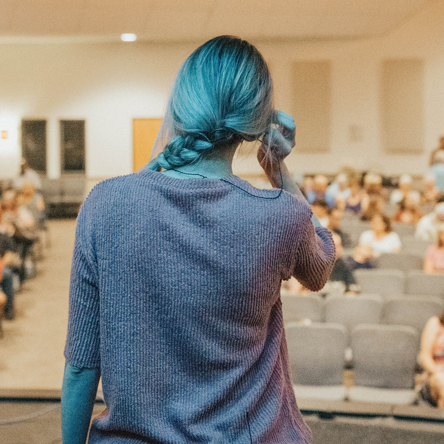 Girl with braid on stage