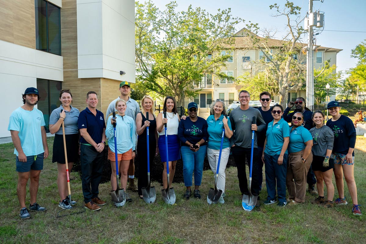 Community Volunteers With Shovels