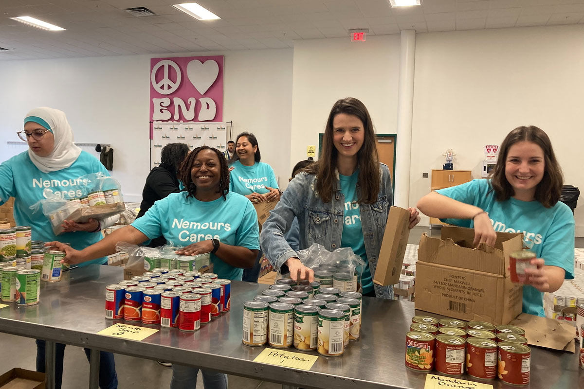 food bank volunteers sorting cans