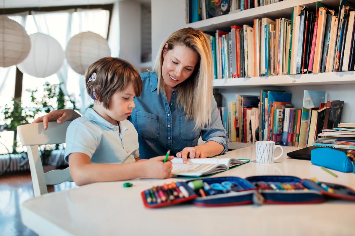 mother and son doing homework